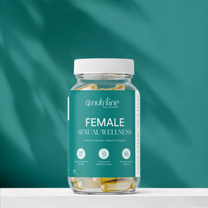 A clear bottle labeled Female Sexual Wellness holds capsules supporting female reproductive health, set against a teal background with soft shadows.