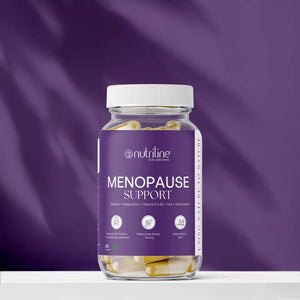 A clear jar labeled Menopause Support, filled with capsules, sits against a purple background. The label highlights its antioxidant blend of selenium, magnesium, and vitamins to support bone health during menopause.